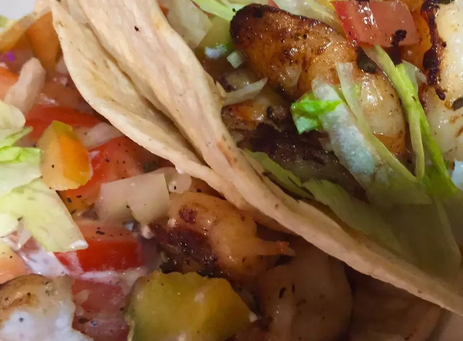 Our Shrimp Taco topped with Mexican Creme! Delicious