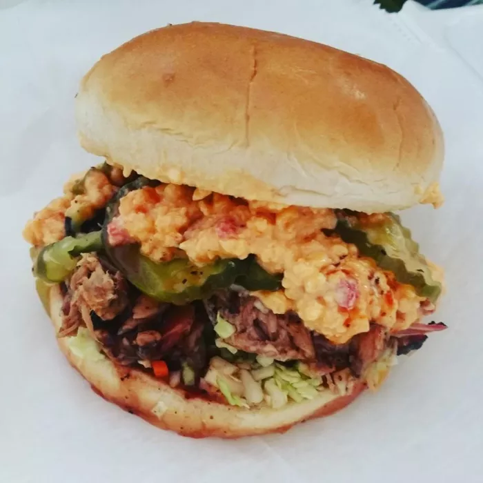 The Boss Hog...Pulled Pork + Pimento Cheese + Cole Slaw + Saw's Sauce + Pickles