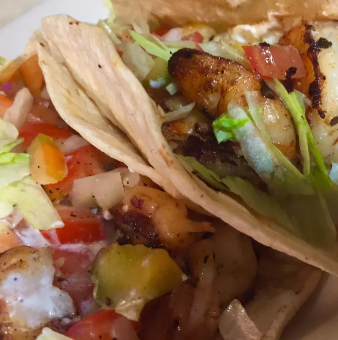 Our Shrimp Taco topped with Mexican Creme! Delicious