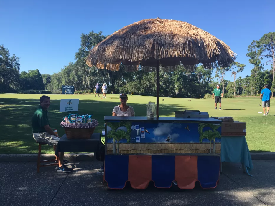 CHICDOGGIE SERVING A INNISBROOK ( JUNIOR ACHIEVEMENT FUND RAISER)